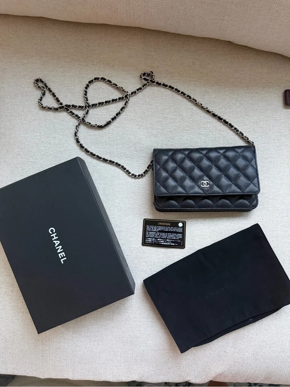 CHANEL Black Quilted Caviar Leather WOC